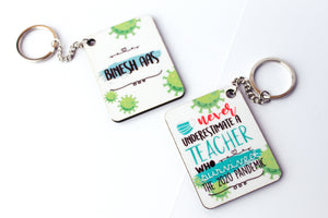 Never Underestimate a Teacher Keychain